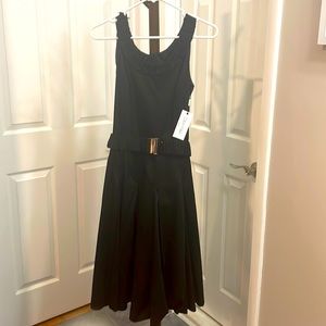Calvin Klein nwt black sleeveless, pleated dress with belt. NWT, size 4